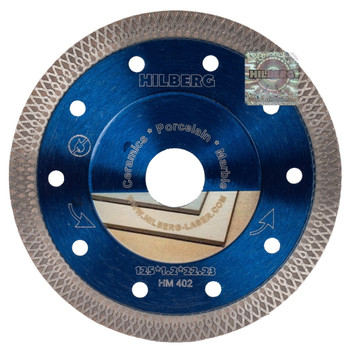 Изображение товара Диск алмазный отрезной Hilberg Турбо 125х22,23 мм для керамики и керамогранита Изображение товара Диск алмазный отрезной Hilberg Турбо 125х22,23 мм для керамики и керамогранита